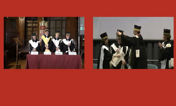 Docenti dei dipartimenti in piedi a Bologna; in collegamento da Londra il Magnifico Rettore conferisce il tocco accademico al regista Ken Loach.